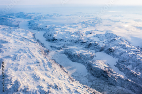 Greenlandic ice cap with frozen mountains and fjord aerial view  near Nuuk  Greenland