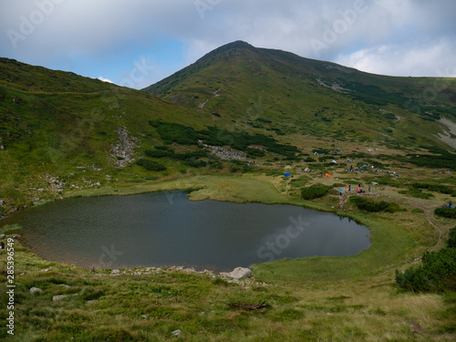 Lake in the Carpathians in the summer sunny day