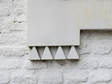 close-up of a detail of a white painted brick wall