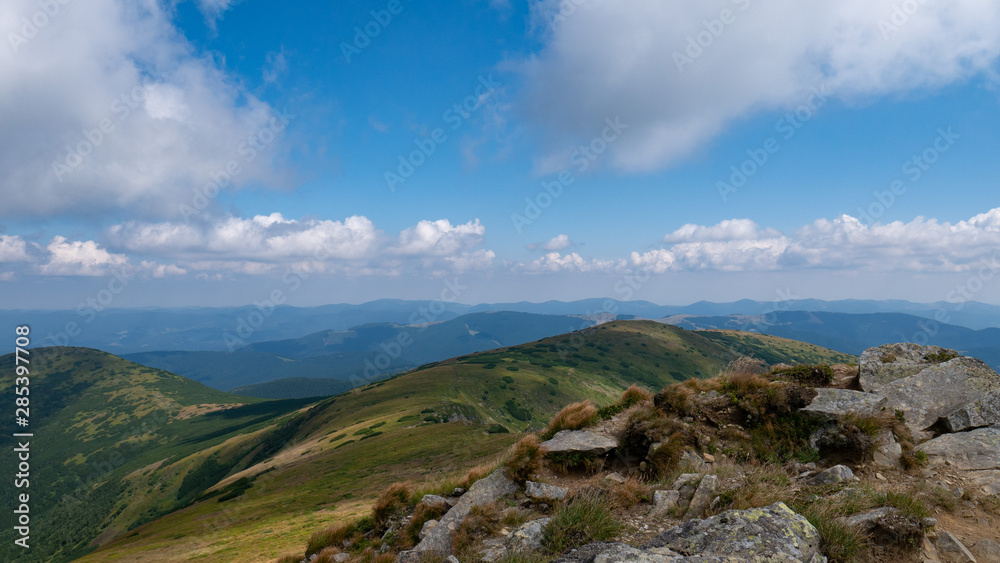 Mountain valley during sunrise / sunset. Natural summer landscape. Colorful summer landscape in the Carpathian mountains.