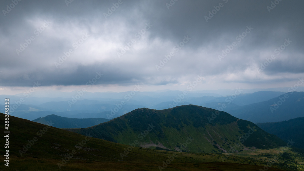 Mountain valley during sunrise / sunset. Natural summer landscape. Colorful summer landscape in the Carpathian mountains.