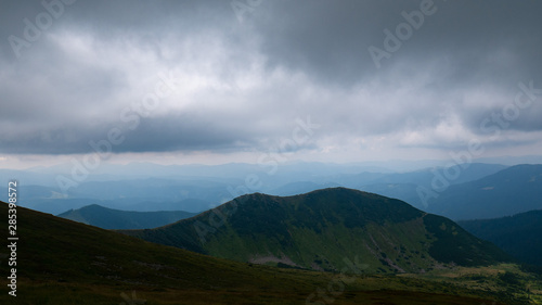 Mountain valley during sunrise / sunset. Natural summer landscape. Colorful summer landscape in the Carpathian mountains.