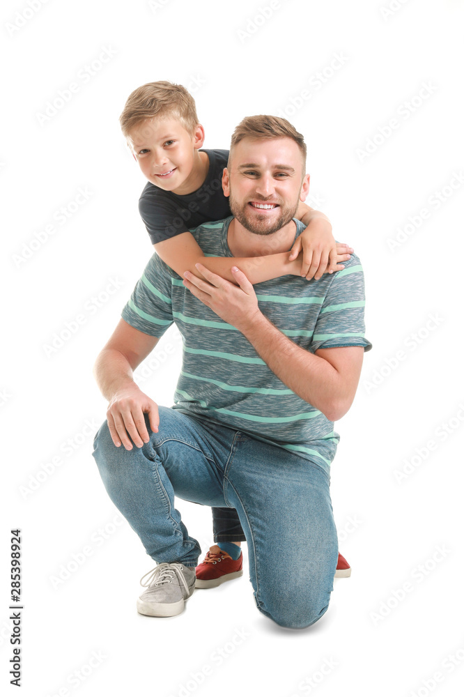 Portrait of happy father and son on white background Portrait of happy father and son on white background