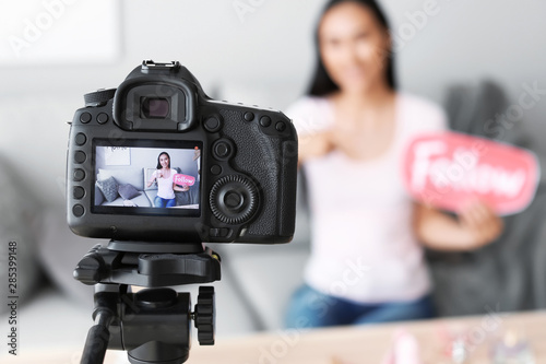 Asian beauty blogger recording video at home © Pixel-Shot