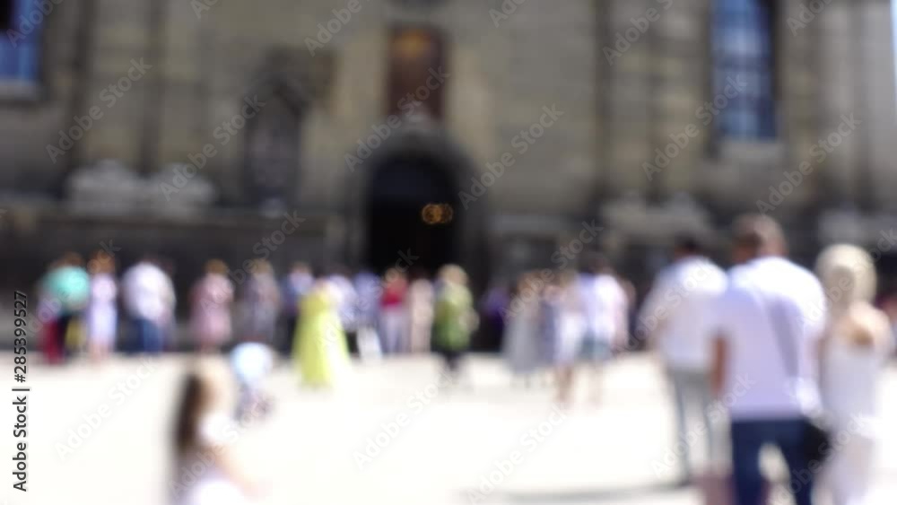 The people near the Catholic Cathedral. Time lapse shoot. Lviv, Ukraine. Out of focus. The people near the Catholic Cathedral. Time lapse shoot. Lviv, Ukraine. Out of focus.