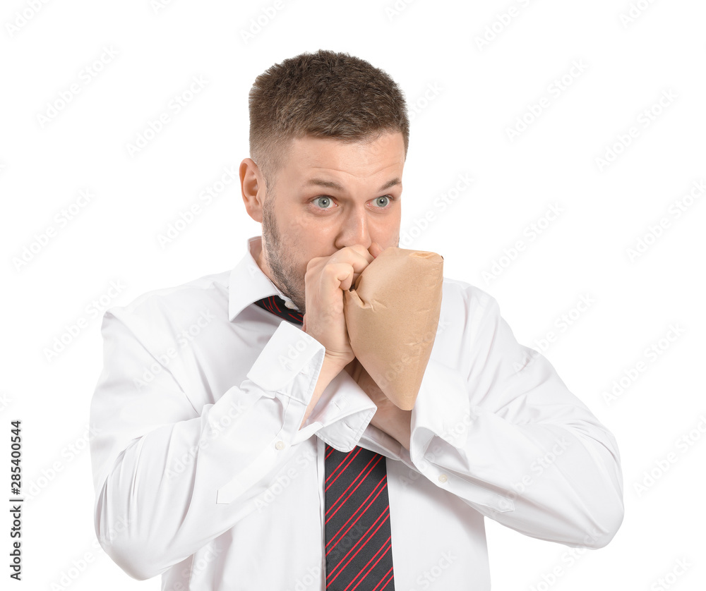 Businessman having panic attack on white background Businessman having panic attack on white background