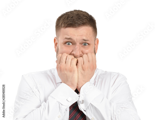 Businessman having panic attack on white background