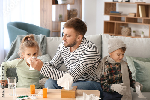 Father taking care of his s...