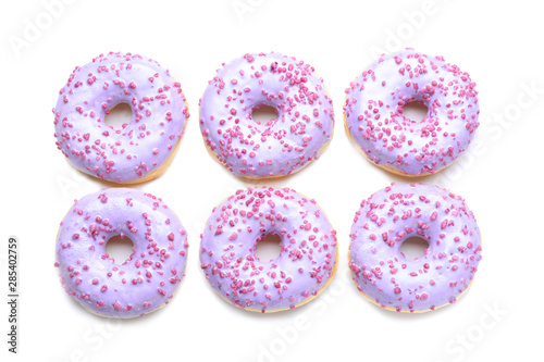 Sweet tasty donuts on white background © Pixel-Shot