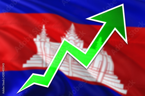 Cambodia economy graph is indicating positive growth, green arrow going up with trend line. Business concept on national background.