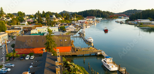A Red Troller Boat Navigates the Swinomish Channel at La Conner Wahington photo