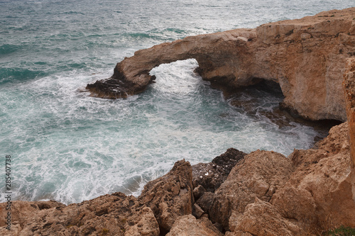 Rocky shore of Cyprus with waves crashing
