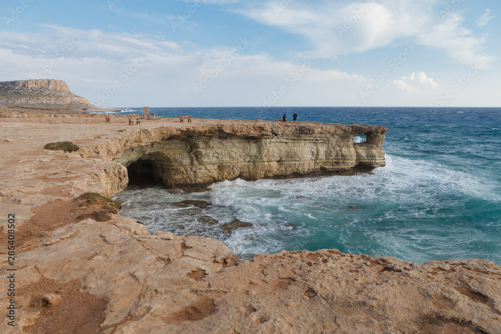Rocky shore of Cyprus with waves crashing Rocky shore of Cyprus with waves crashing