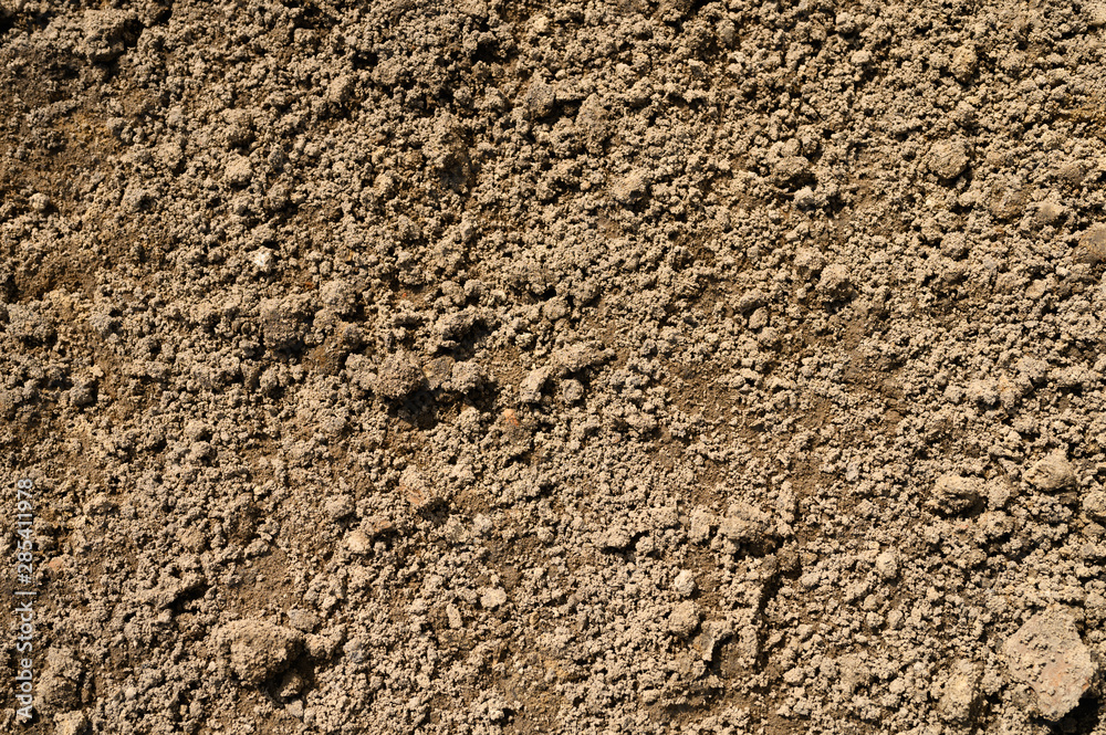 Textured ground surface as background, top view