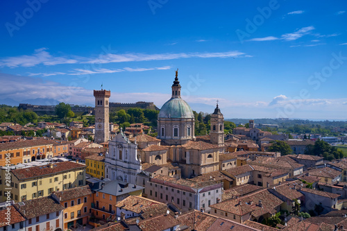 Fototapeta Naklejka Na Ścianę i Meble -  Aerial photography with drone. Church Parrocchia della Nativita di San Giovanni Battista on the mountain in the city of Lonato, Italy