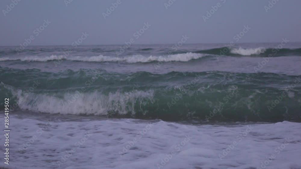Waves on the sea beach in the evening Waves on the sea beach in the evening