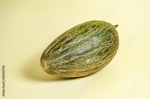 Wallpaper Mural Creative photo of tasty melon on yellow background. Close up view on sweet summer fruit melon. Food photo concept. Art work with Watermelon Torontodigital.ca
