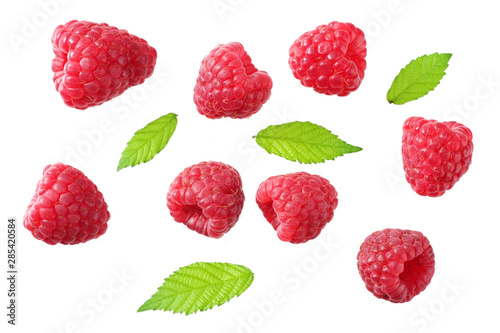 ripe raspberries with green leaf isolated on white background. top view