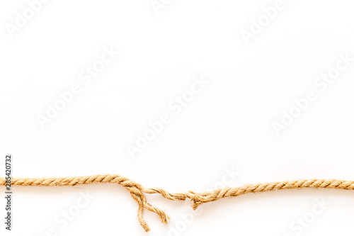 risk concept with rope near to break on white background top view space for text