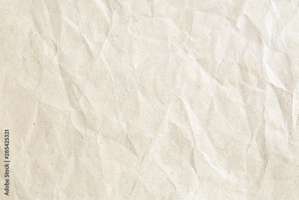 Old pale brown crumpled paper background texture Old pale brown crumpled paper background texture