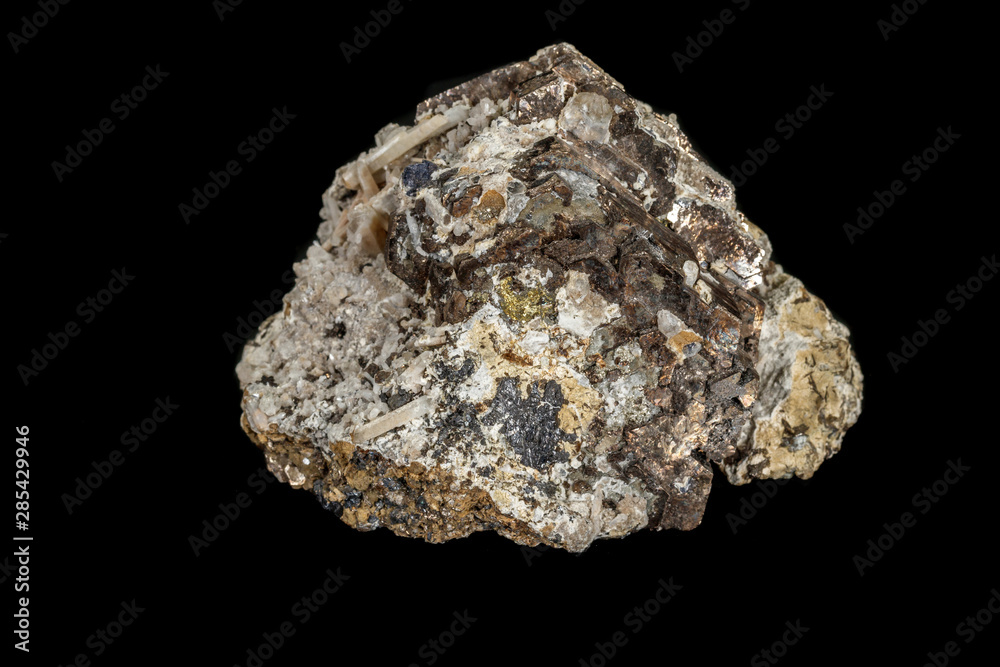 Macro stone mineral pyrite and quartz on a black background