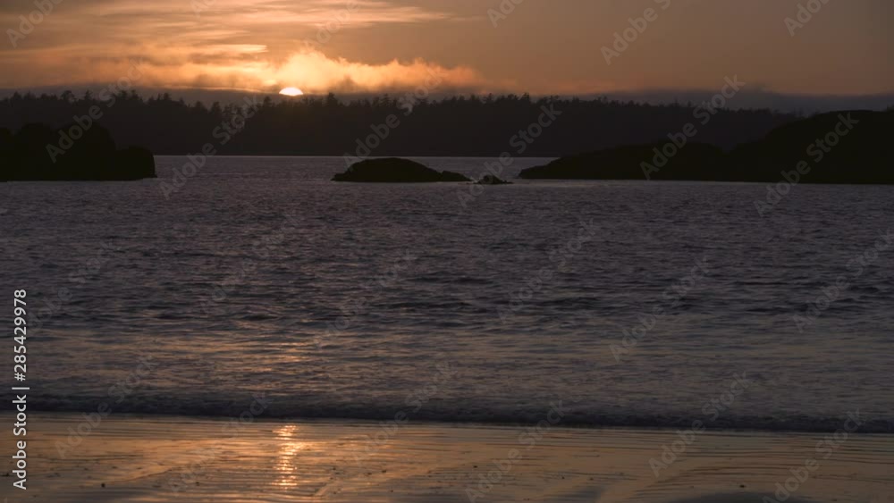 Long Beach Sundown Vancouver Island 4K UHD. Mackenzie Beach sunset on the west coast of Vancouver Island in Tofino. BC, Canada. 4K UHD. Long Beach Sundown Vancouver Island 4K UHD. Mackenzie Beach sunset on the west coast of Vancouver Island in Tofino. BC, Canada. 4K UHD.