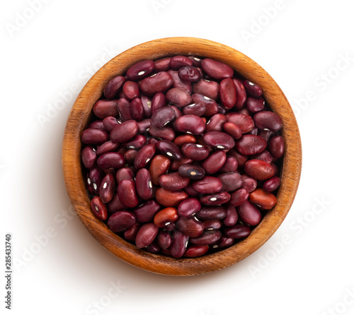 Red beans in wooden bowl isolated on white background