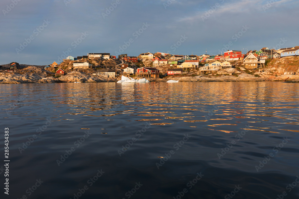 The colorful houses of Rodebay, Greenland. This settlement is located on a small peninsula jutting off the mainland into eastern Disko Bay, 22.5 km north of Ilulissat. UNESCO World Heritage