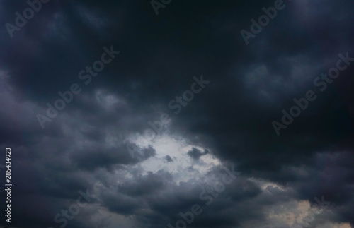 Dark sky and dramatic storm rain clouds abstract background © sirinyapak