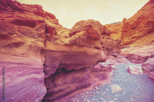Red Canyon, Eilat, Israel. Dry riverbed, wilderness. Desert nature landscape. Stone texture. Abstract stone nature background