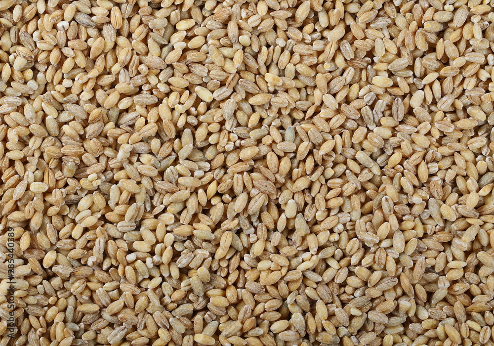 Peeled barley grains background and texture Peeled barley grains background and texture