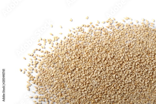 Organic integral sesame seeds isolated on white background, top view photo