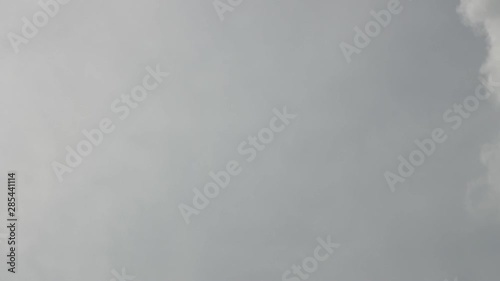 Video timelapse white clouds and Moving in the gray sky. 4k time lapse beautiful gray sky with clouds background.