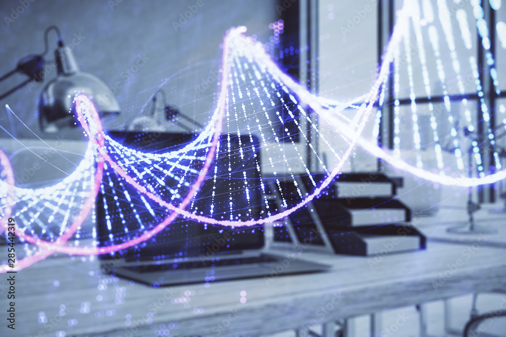 Obraz premium DNA hologram with desktop office background. Double exposure. Concept of education
