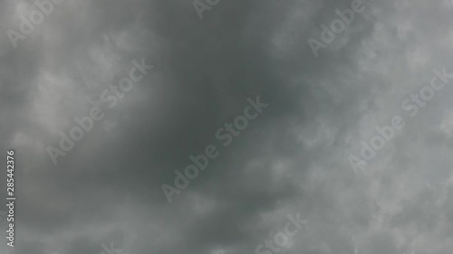 Video timelapse white clouds and Moving in the gray sky. 4k time lapse beautiful gray sky with clouds background.