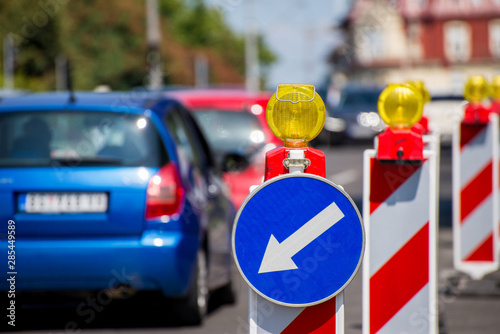Diverting traffic sign on the road