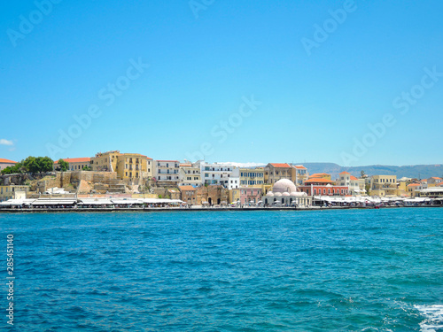 Fototapeta Naklejka Na Ścianę i Meble -  View of the old harbor of Chania with horse carriages and mosque, Crete, Greece