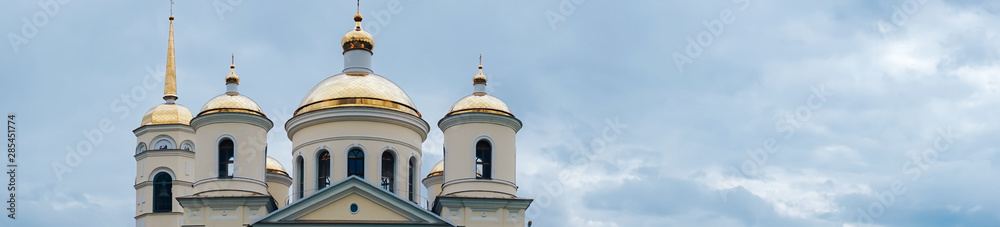 panorama of the church in the blue sky with white clouds panorama of the church in the blue sky with white clouds