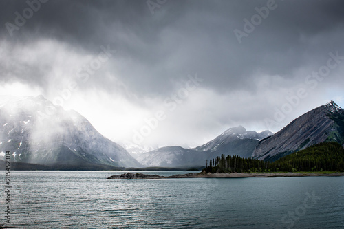 Hiking under the clouds and rain at the Upper Kananaskis Lake in the Canadian Rockies in Alberta © RLS Photo
