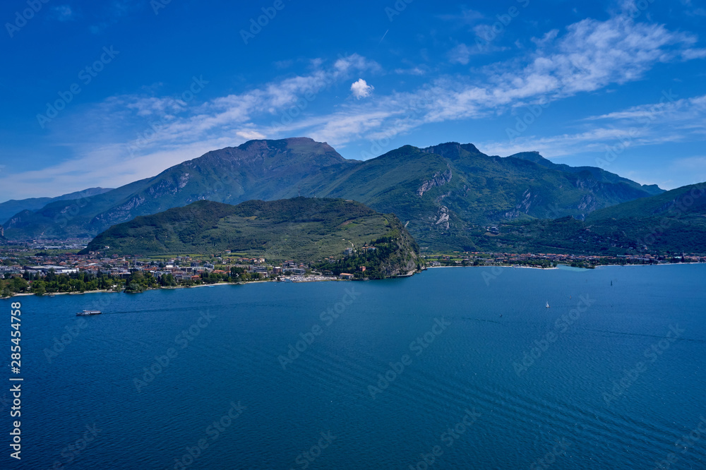Panorama of Lake Garda surrounded by mountains in Riva del Garda, Italy. Lake Garda Italy. Aerial view Panorama of Lake Garda surrounded by mountains in Riva del Garda, Italy. Lake Garda Italy. Aerial view