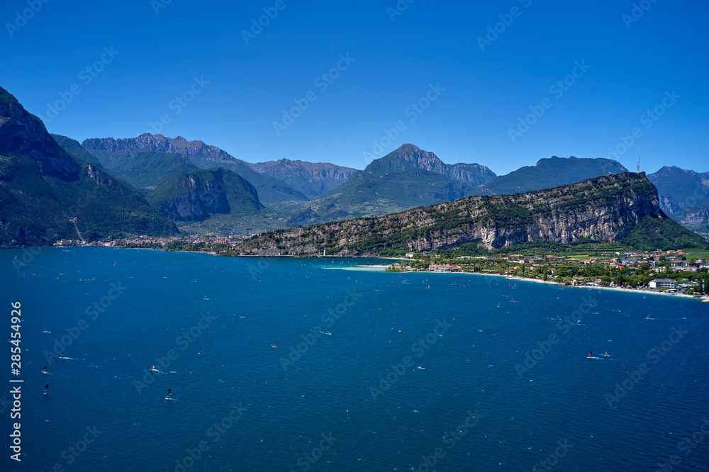 Panorama of Lake Garda surrounded by mountains in Riva del Garda, Italy. Lake Garda Italy. Aerial view