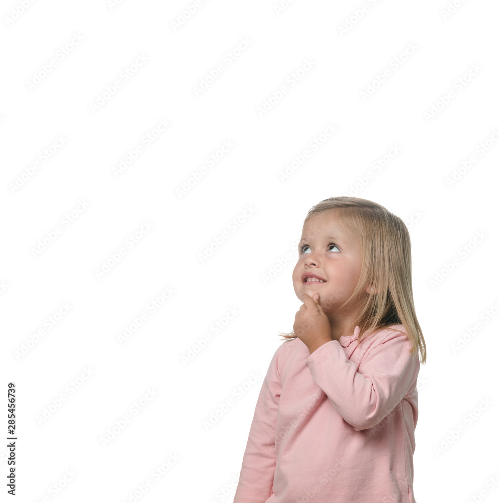 Portrait of a blonde little girl pensive on the white background Portrait of a blonde little girl pensive on the white background