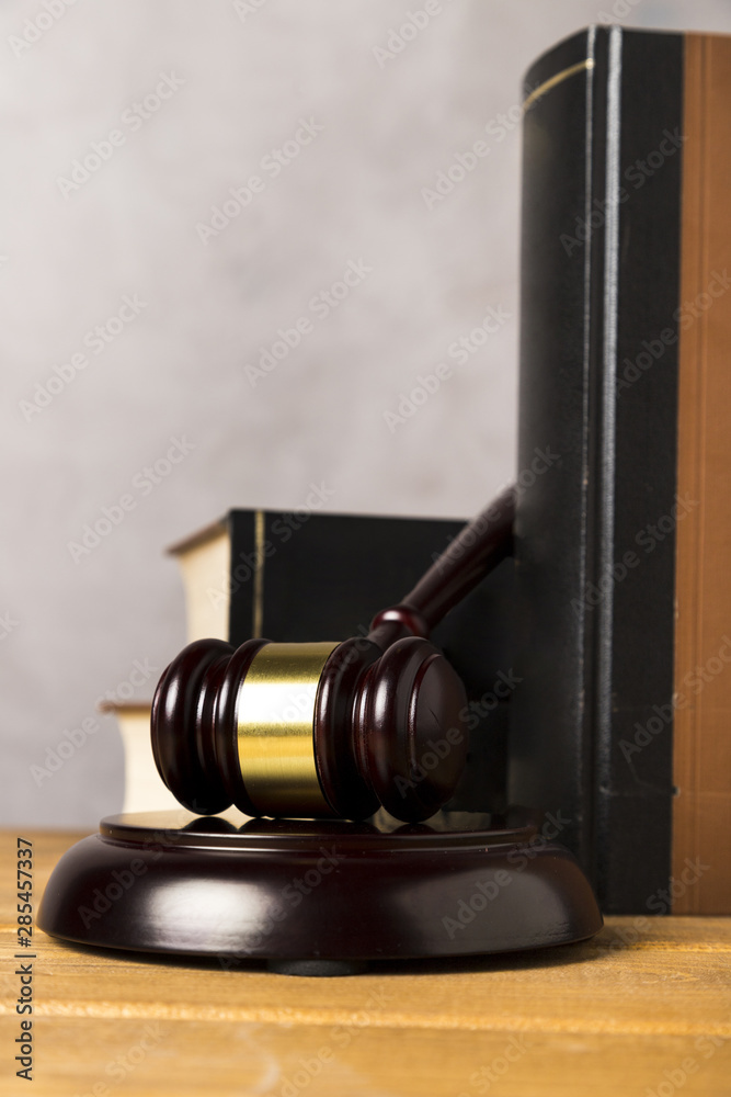 Close-up arrangement with books and judge gavel