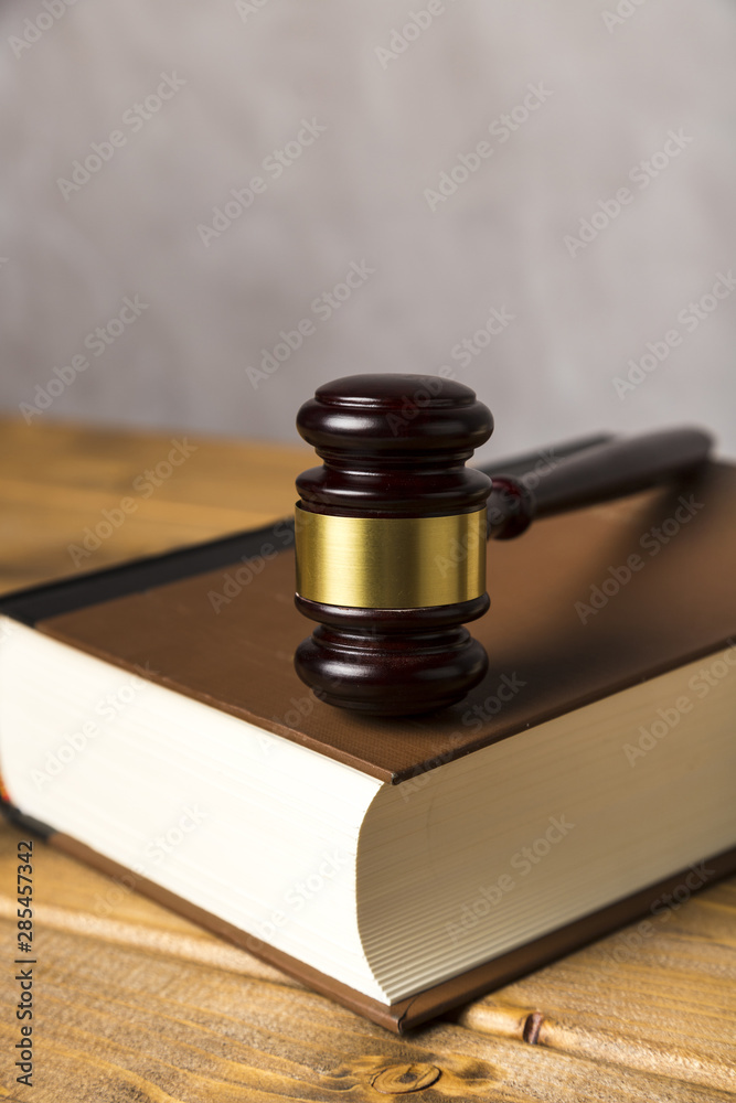 Close-up with judge gavel on a book Close-up with judge gavel on a book