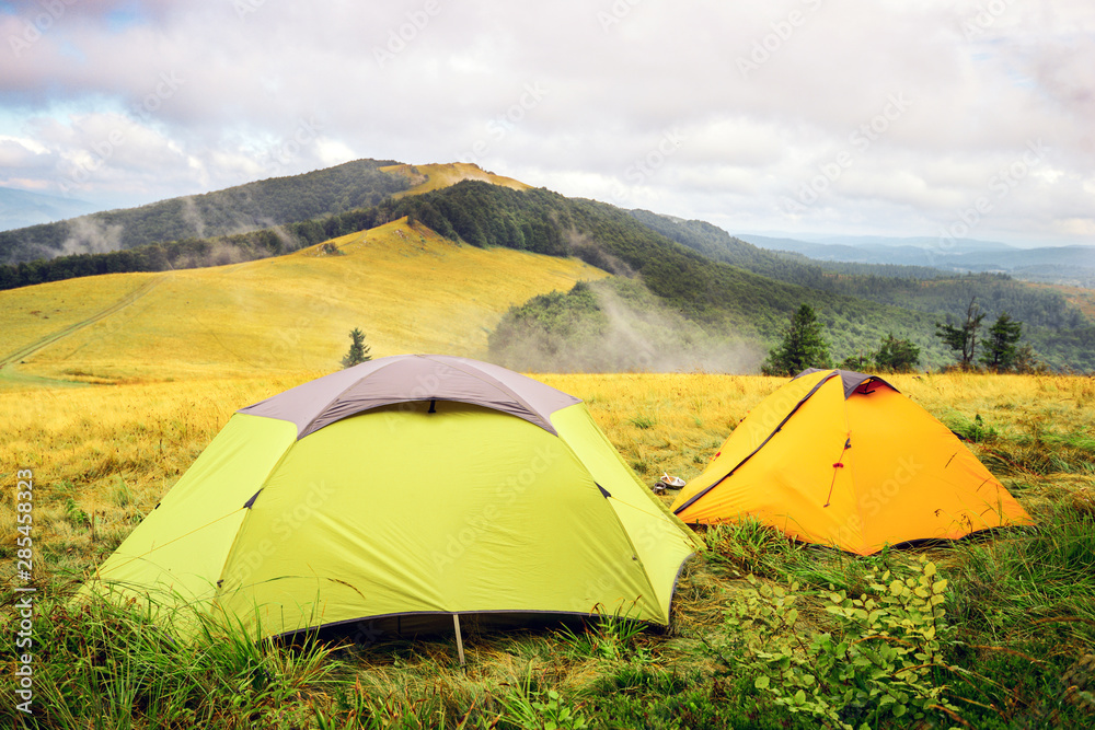 tents in the mountains hiking outdoor activities
