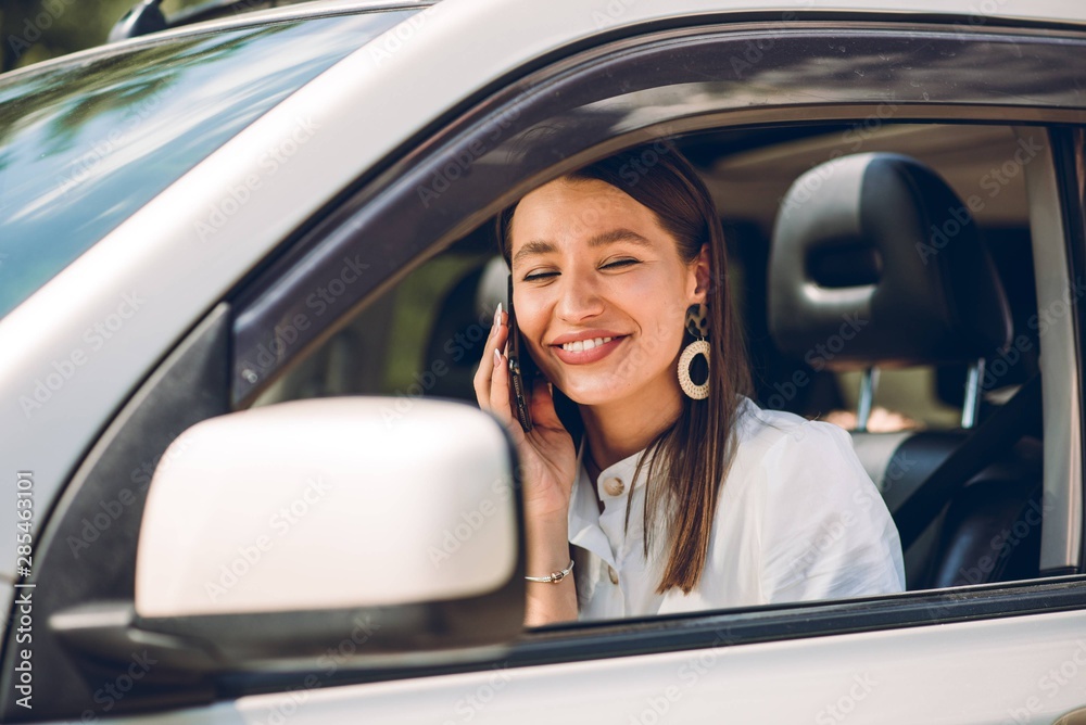 In a young beautiful woman's car was broken during the trip, she tries to call the tow truck