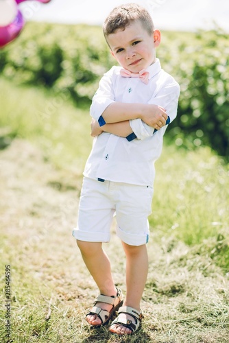 Young boy in white shirt run on the field © Олег Кошевський