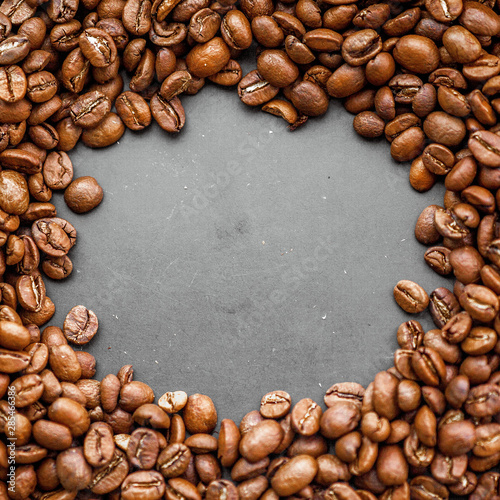 Roasted coffee beans heap background