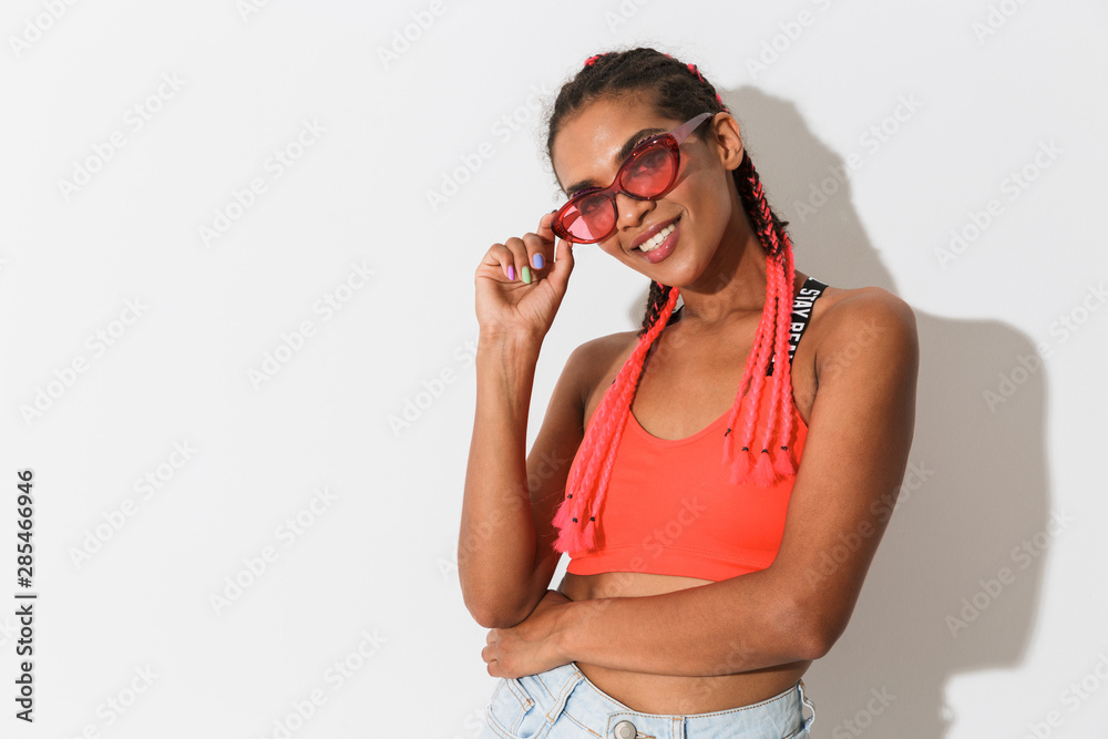 Attractive young african woman wearing summer outfit Attractive young african woman wearing summer outfit