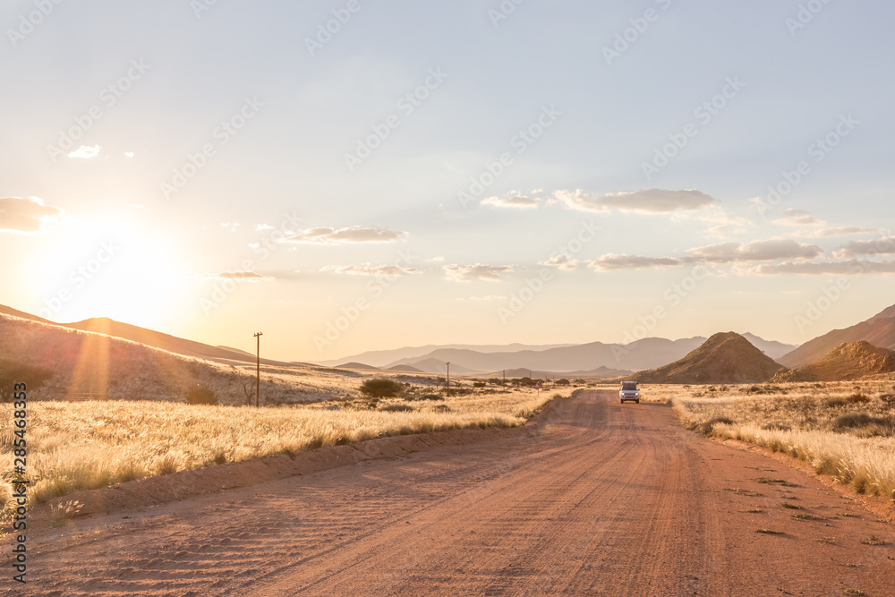 Fototapeta premium Sunset drive through desert landscape